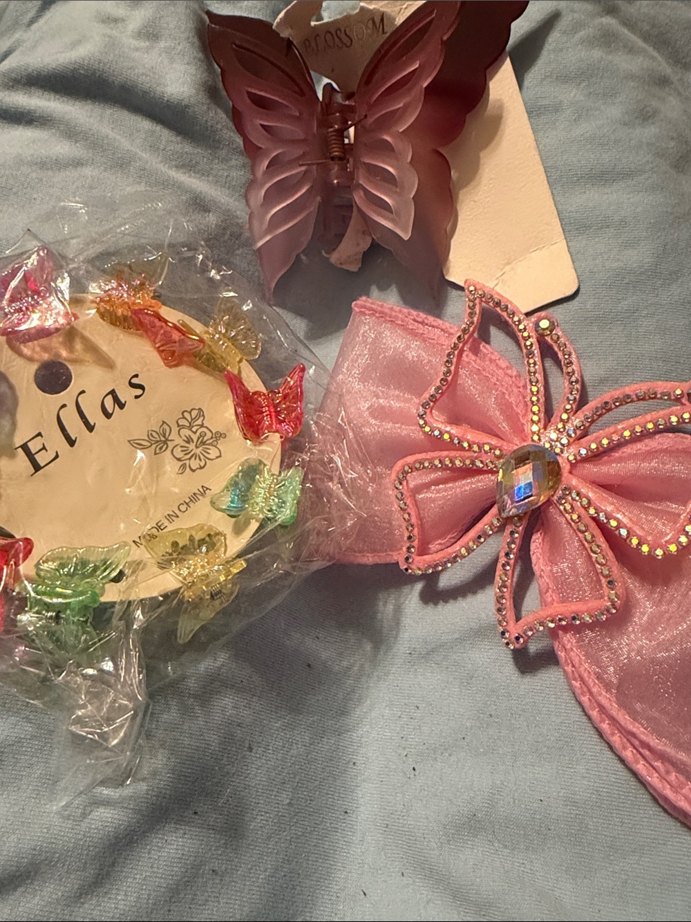 Multiples Pink Bow with Gem & Assorted Translucent Butterfly Clips